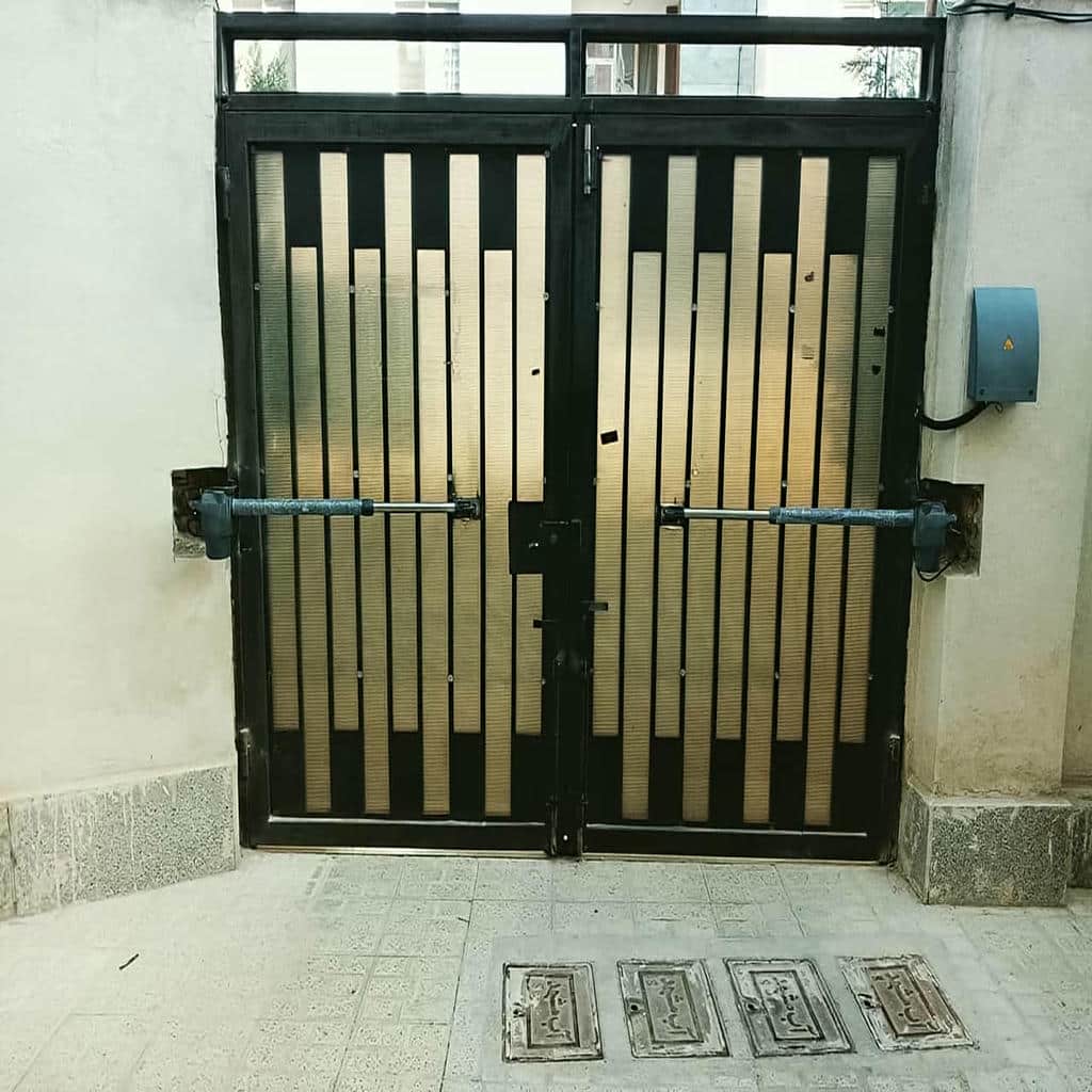جک درب پارکینگی با کورس بازوی مناسب برای درب دو لنگه جک درب پارکینگی با کورس بازوی مناسب برای درب دو لنگه