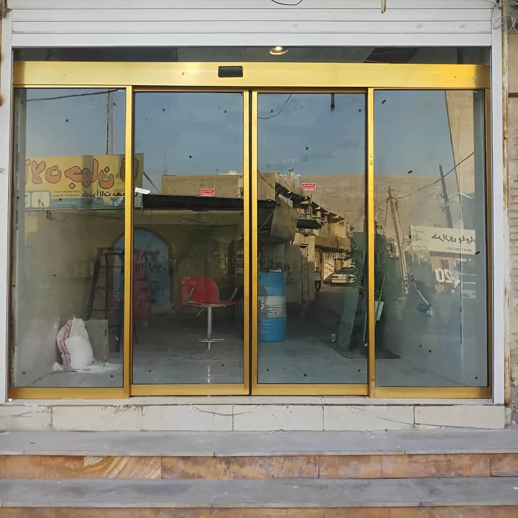 قیمت مناسب درب اتوماتیک شیشه ای اداری کارتخوان با باتری پشتیبان