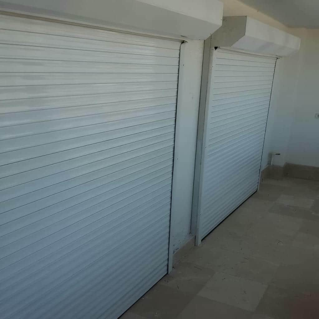 سفارش درب کرکره ای پارکینگ اتوماتیک با بررسی شرایط دهانه
