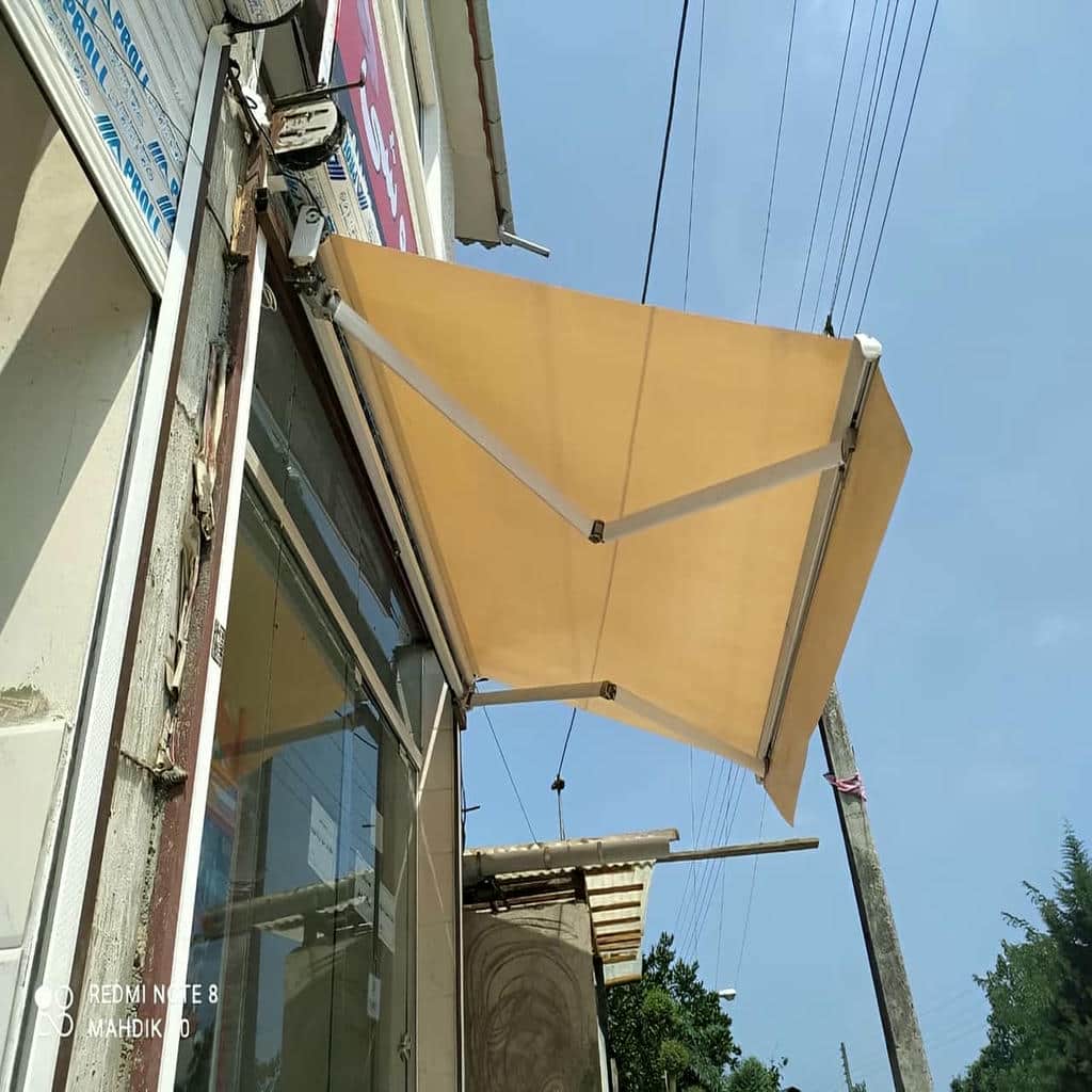 سایبان پارکینگ بازویی با پوشش مقاوم