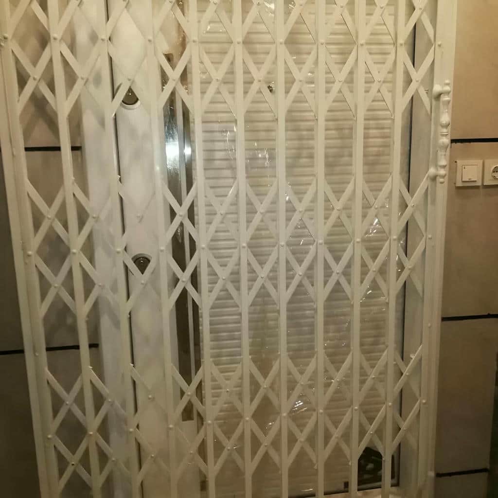 حفاظ درب آکاردئونی فلزی استان کرمانشاه ورودی آپارتمان