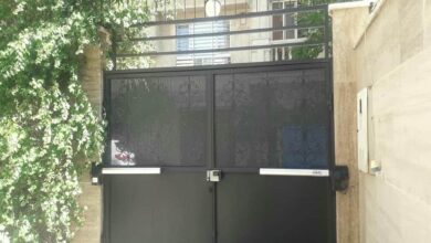 جک درب پارکینگ استان کرمان با مدل بازویی ورودی ساختمان