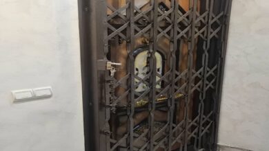 حفاظ درب آکاردئونی گرگان مدل فلزی مشکی