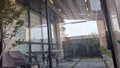 سایبان برقی بازویی قم با پوشش مقاوم